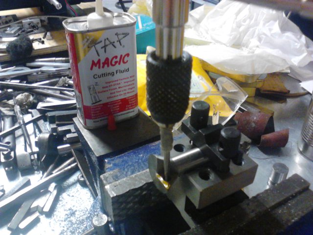 Tapping a thread for the insert screw