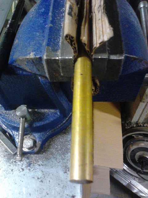Cutting a piece of brass